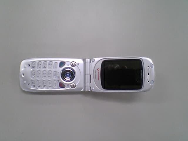 1900 MHz GSM Cellular Phone - FCC ID APYHRO00032 - Sharp Corporation (1)