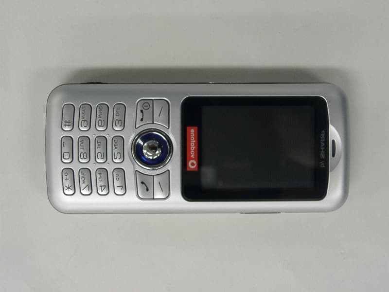 1900MHz GSM Cellular Phone W/Bluetooth - FCC ID APYHRO00035 - Sharp Corporation (1)