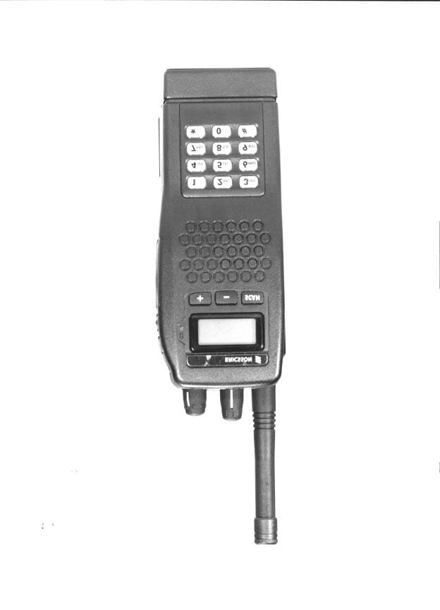 TNF - Licensed Non-Broadcast Transmitter Held to Face - FCC ID AXATR-382-A2 - HARRIS CORPORATION