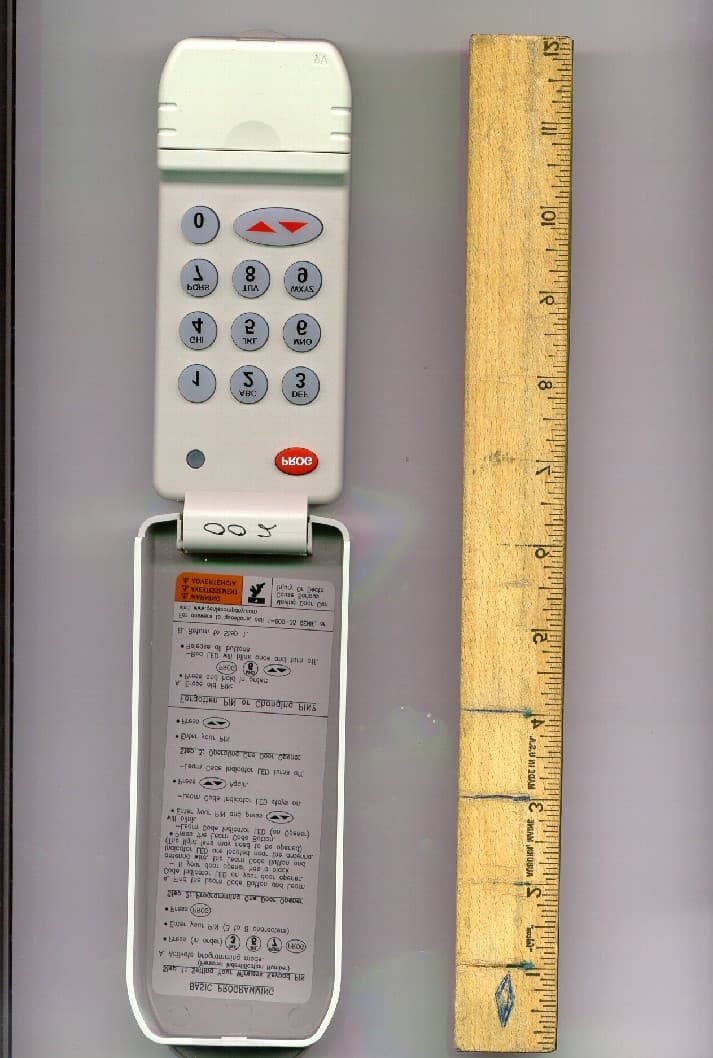 GARAGE DOOR OPENER TRANSMITTER - FCC ID B8QACSDA1 - The Genie Company a Division of Overhead Door Corporation
