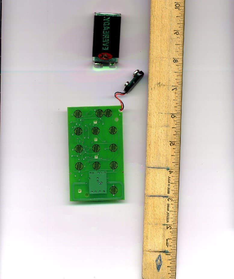 GARAGE DOOR OPENER TRANSMITTER - FCC ID B8QACSDA1 - The Genie Company a Division of Overhead Door Corporation (4)