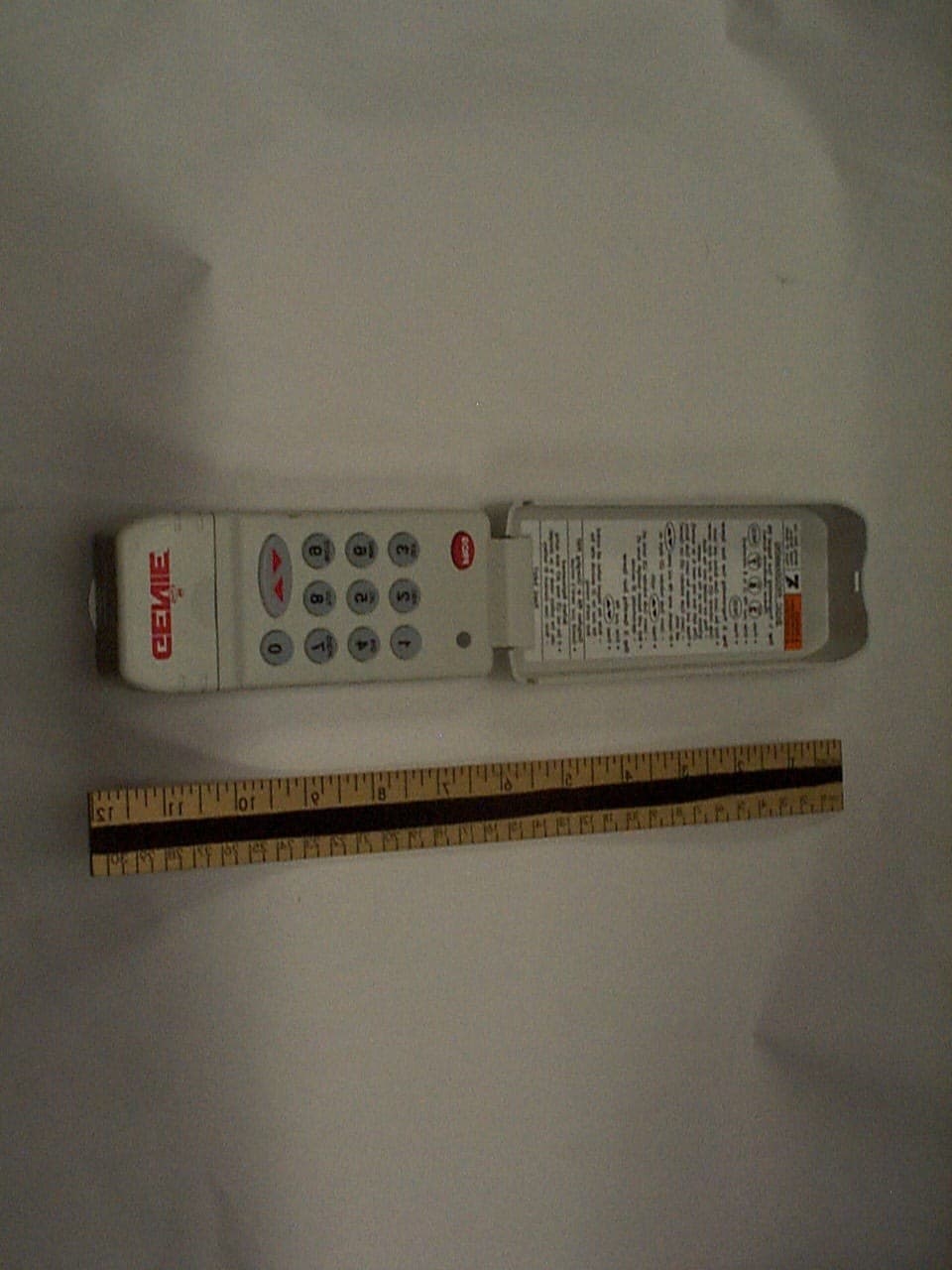 GARAGE DOOR OPENER TRANSMITTER - FCC ID B8QKP390 - The Genie Company a Division of Overhead Door Corporation