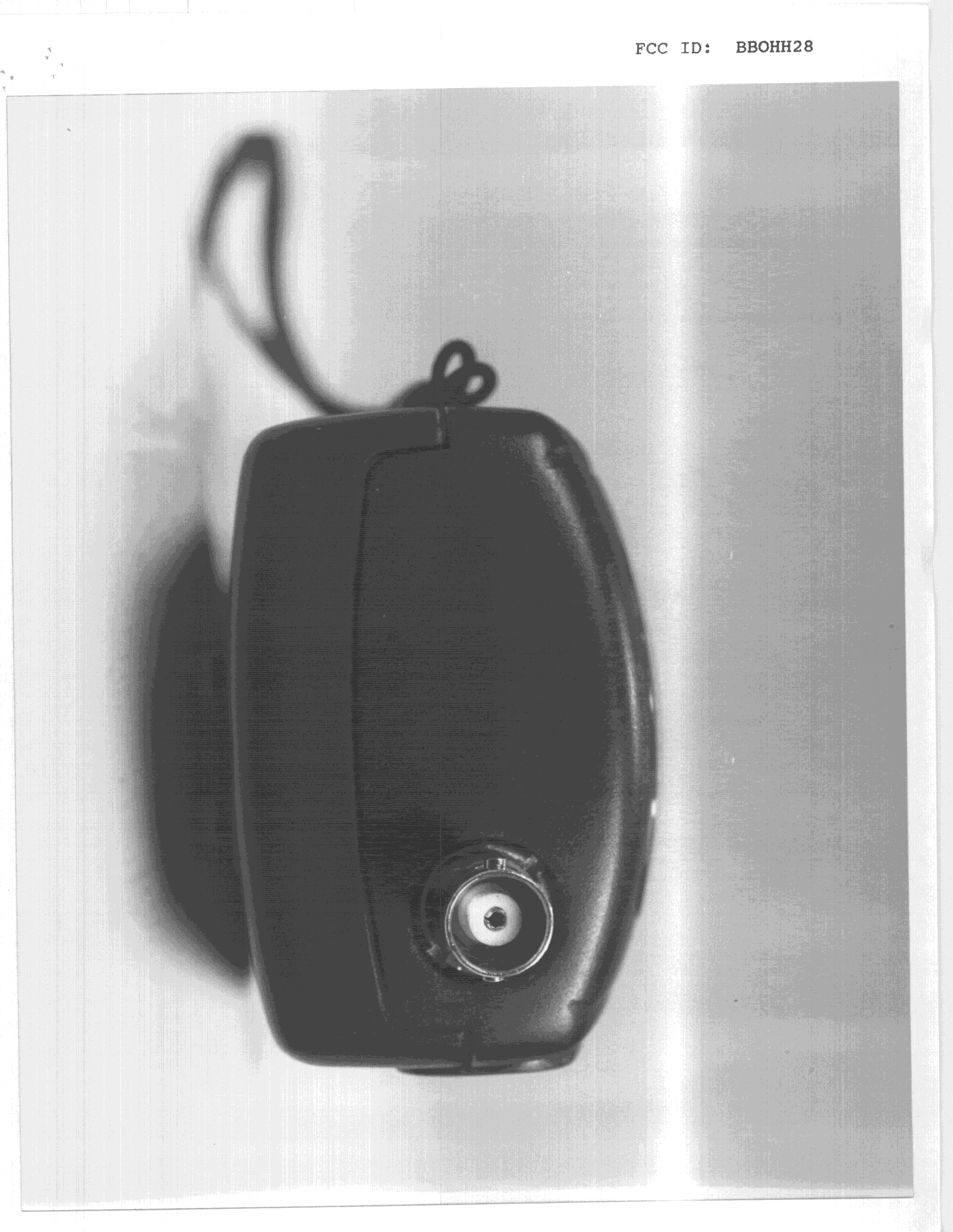 TNF - Licensed Non-Broadcast Transmitter Held to Face - FCC ID BBOHH28 - Cobra Electronics Corporation (4)