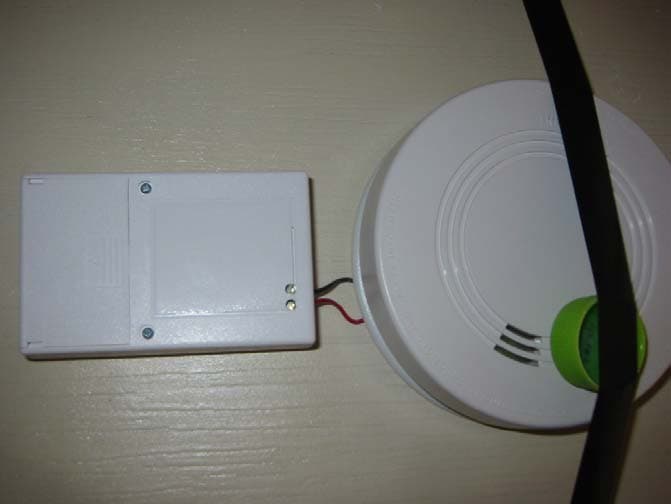 Smoke Detector Transmitter - FCC ID BDZAT410 - Lifeline Systems Inc