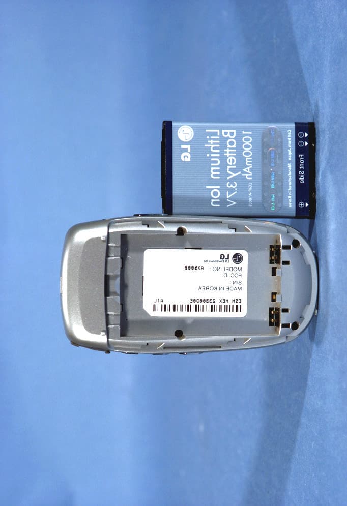 Tri-Mode Dual-Band Analog/PCS Phone (AMPS/CDMA) - FCC ID BEJAX5000 - LG Electronics USA, Inc. (1)