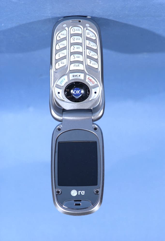 Tri-Mode Dual-Band Analog/ PCS Phone (AMPS/CDMA) - FCC ID BEJLX125 - LG Electronics USA, Inc. (1)
