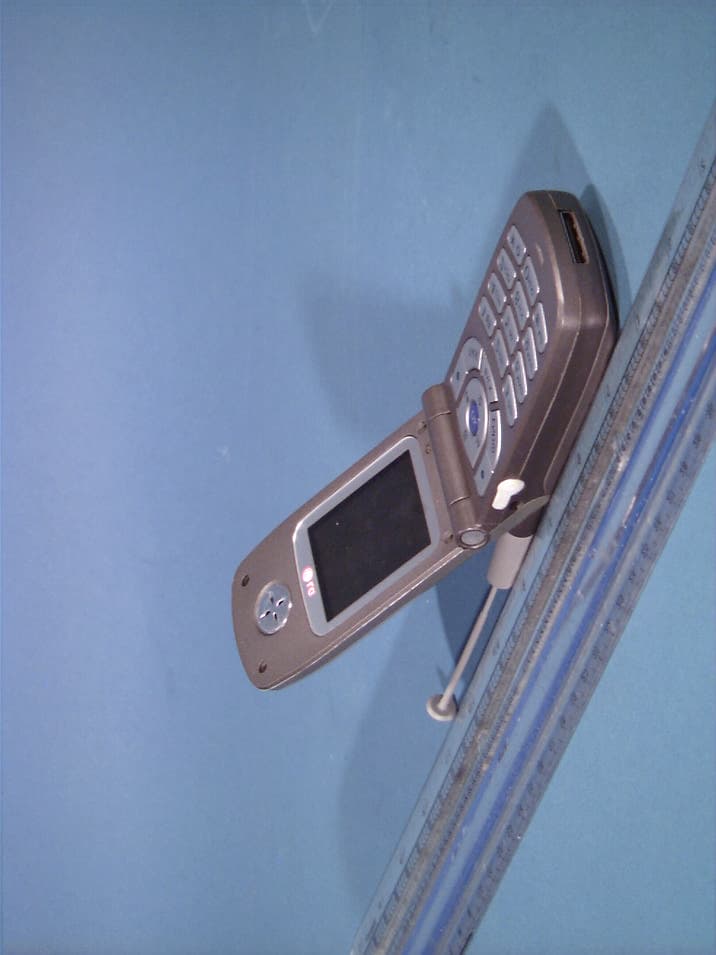Tri-Mode Dual-Band Analog/PCS Phone(AMPS/CDMA/GPS) - FCC ID BEJLX5450 - LG Electronics USA, Inc. (5)