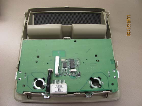 HomeLink Universal Garage Door Opener - FCC ID CB2051AHL4 - Johnson Controls Interiors L.L.C.