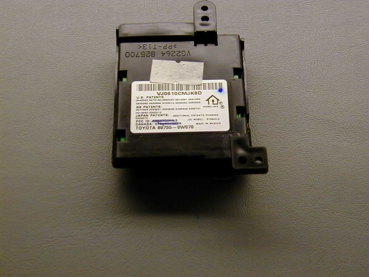 Universal Garage Door Opener - FCC ID CB2SJAAHL3 - Johnson Controls Interiors L.L.C.