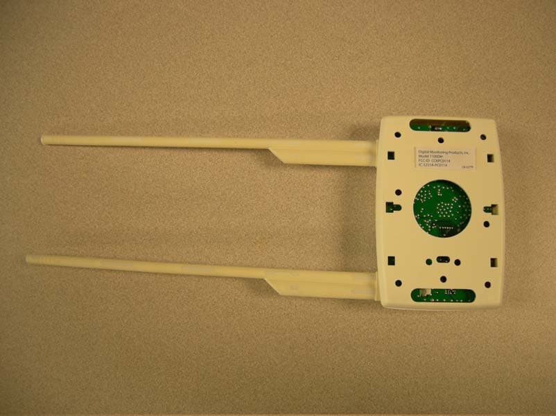 LOW POWER SPREAD SPECTRUM TRANSMITTER - FCC ID CCKPC0114 - Digital Monitoring Products Inc