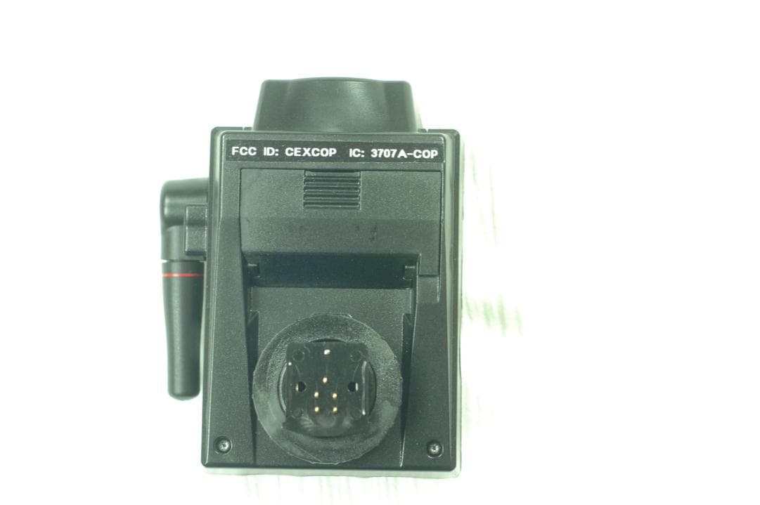 A Wireless Radio Commander Unit for Digital Cameras to Control Remote Flashes - FCC ID CEXCOP - Quantum Instruments Inc