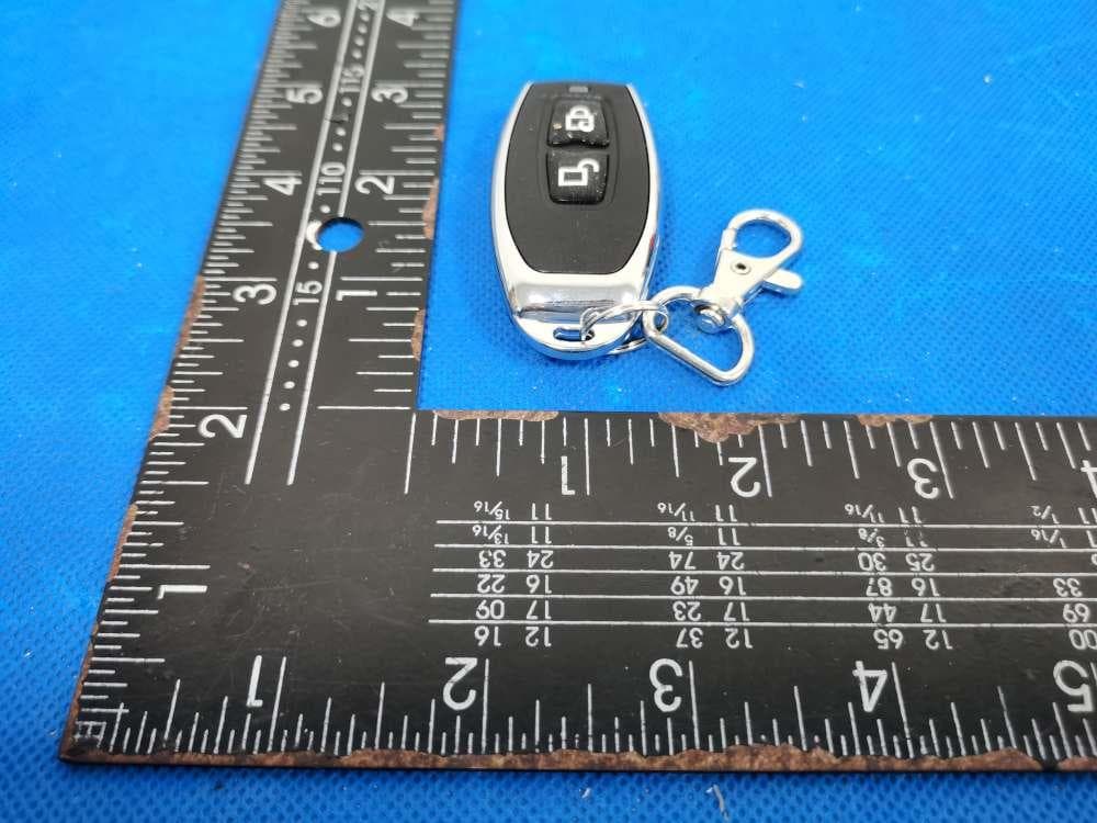 Remote control - FCC ID CFS-2C2BPTRAN - Ademco Inc. (5)