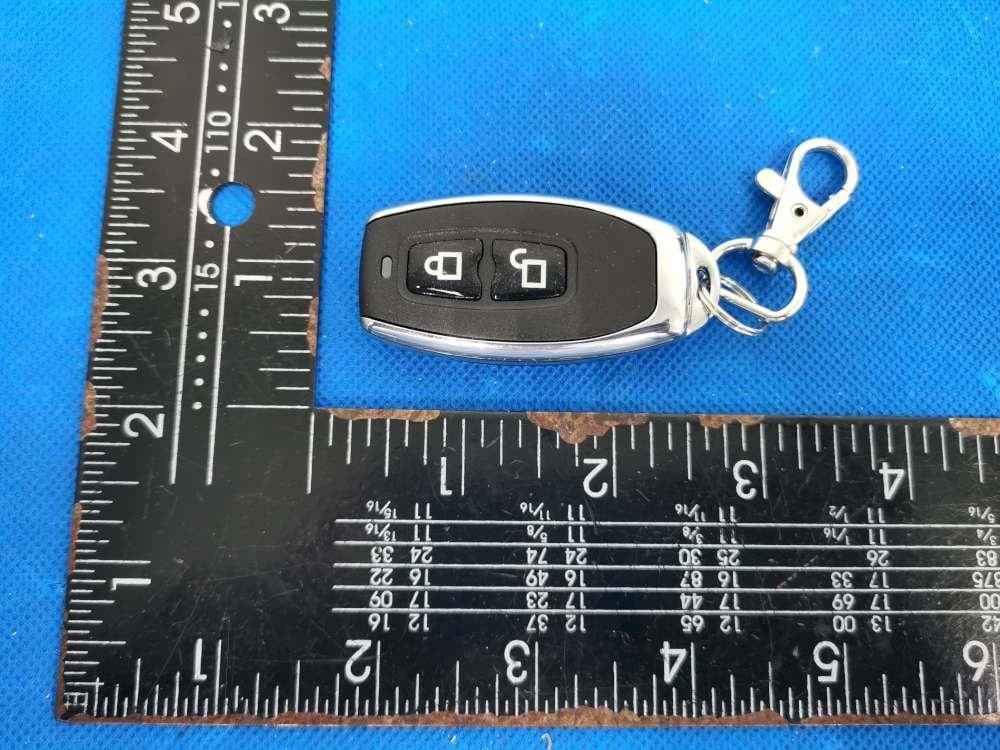 Remote control - FCC ID CFS-2C2BPTRAN - Ademco Inc. (2)