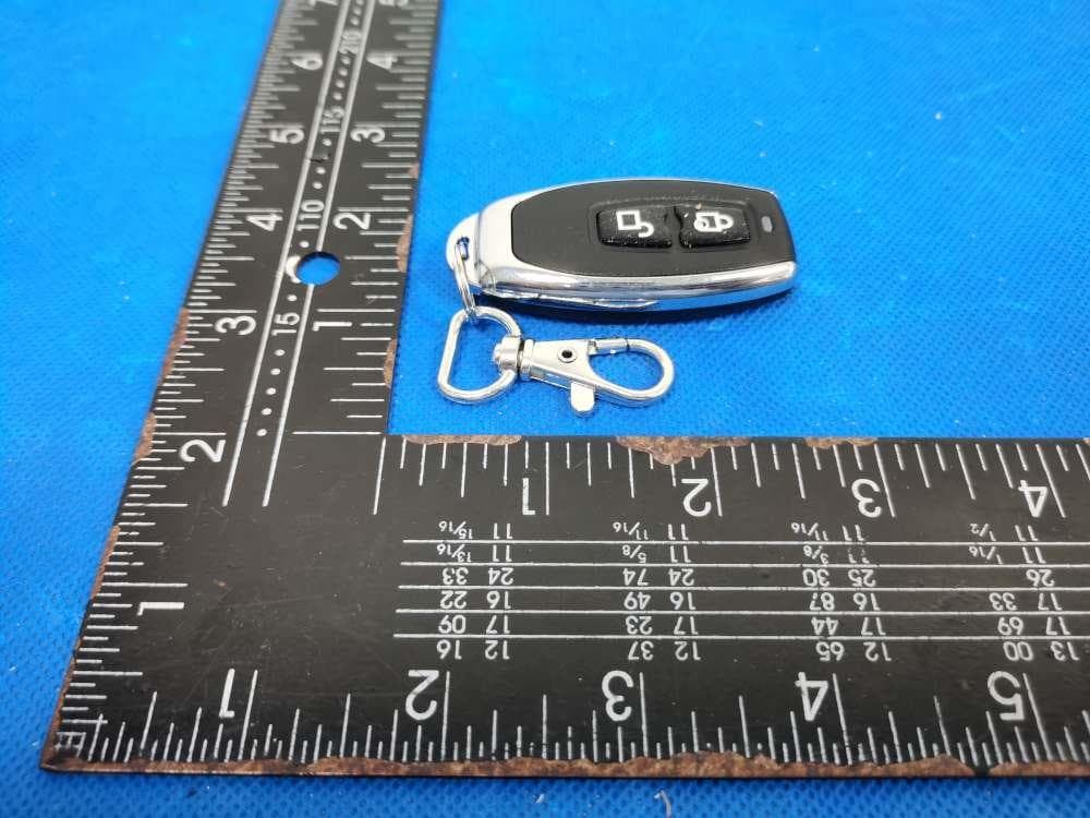 Remote control - FCC ID CFS-2C2BPTRAN - Ademco Inc. (4)