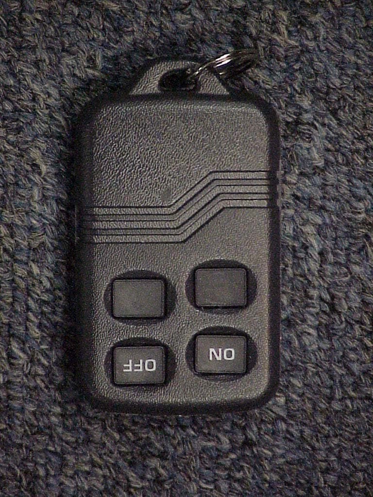 Key fob security transmitter - FCC ID CFS8DL5804AP - Ademco Inc.