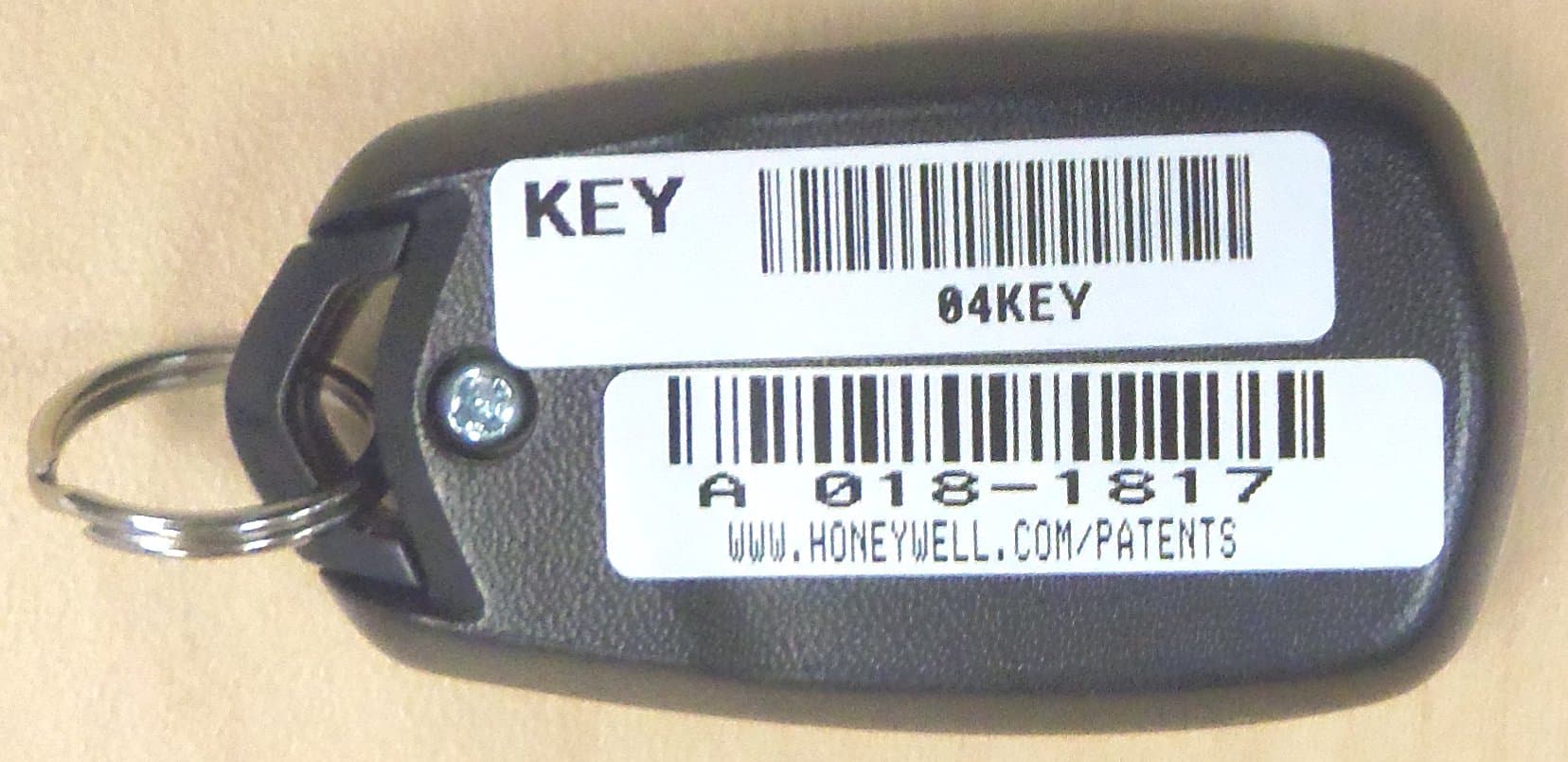 Wireless Key Transmitter - FCC ID CFS8DL582 - Ademco Inc.