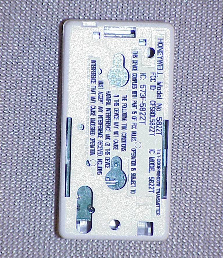Tilt Sensor Transmitter - FCC ID CFS8DL5822T - Ademco Inc.