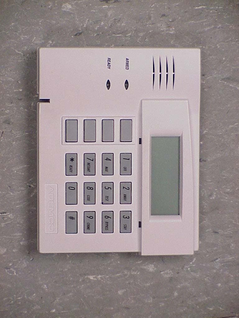 Keypad trancseiver - FCC ID CFS8DL6150RFT - Ademco Inc.