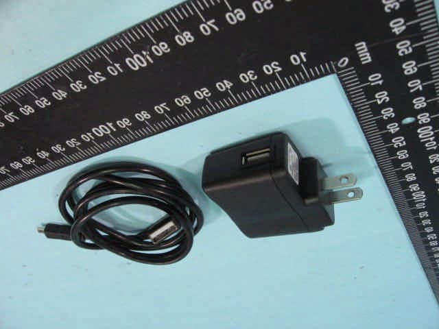 OLED remote - FCC ID CHXFS60TX - Rockford Corporation (1)