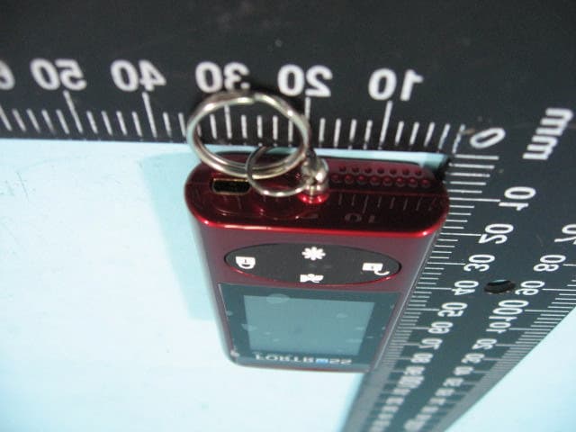 mini touch remote - FCC ID CHXFS90TX915 - Rockford Corporation (4)