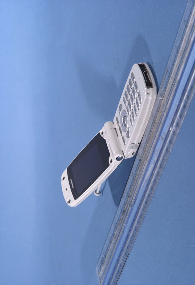 Tri-Mode Dual-Band Analog/PCS Phone (AMPS/CDMA) - FCC ID CJ6DCFC009001 - Dynabook Inc. (2)