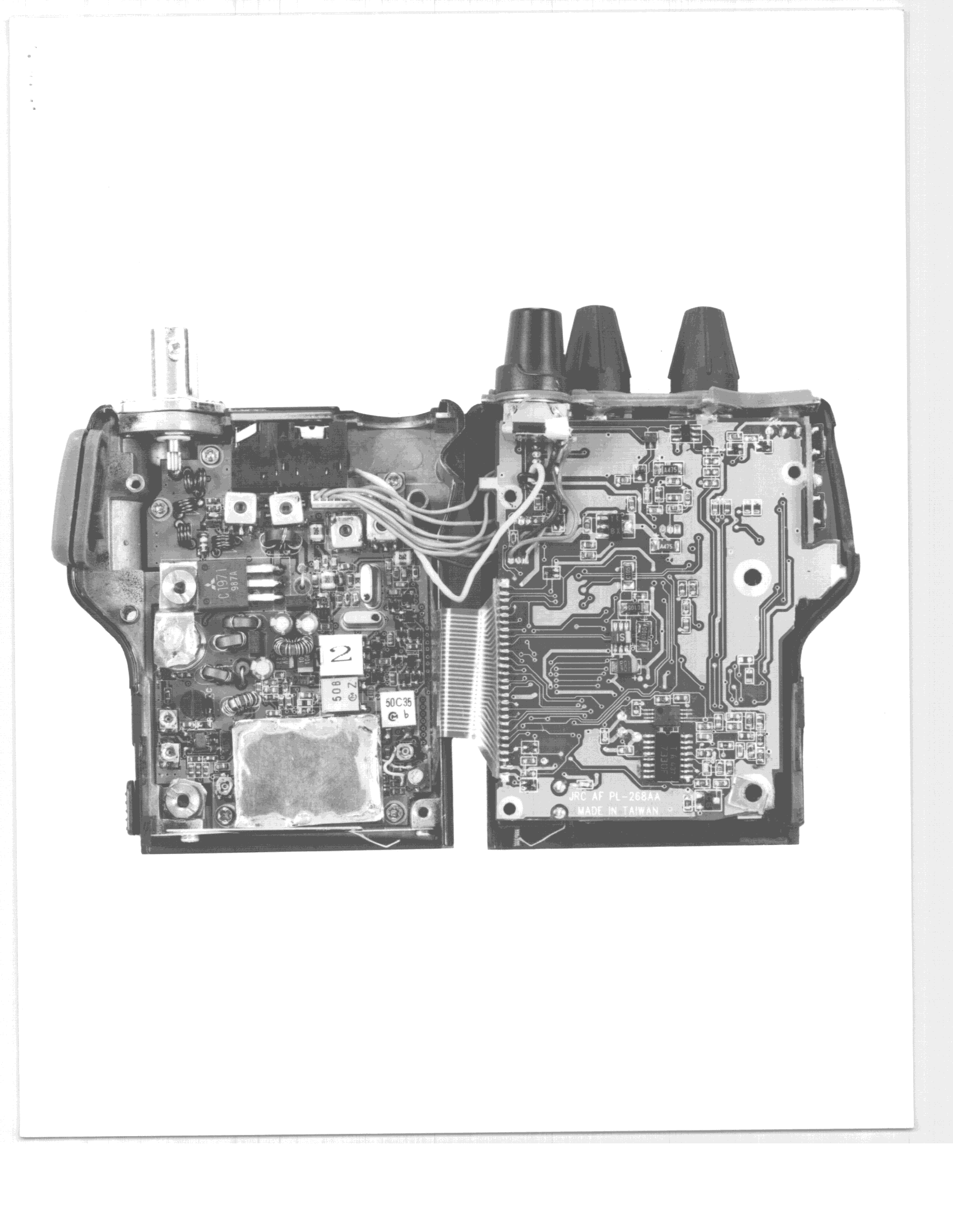 TNF - Licensed Non-Broadcast Transmitter Held to Face - FCC ID CKEJHP-500 - Japan Radio Co., Ltd.
