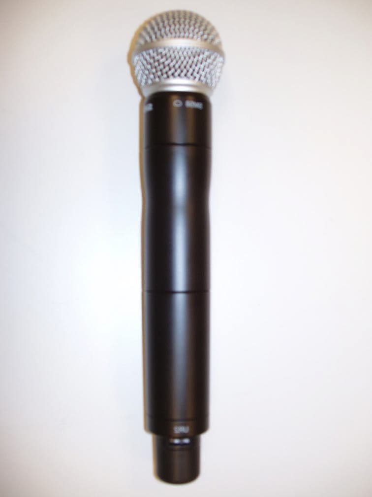 Wireless Transmitter Held to Face - FCC ID DD4UR2 - Shure Incorporated (4)