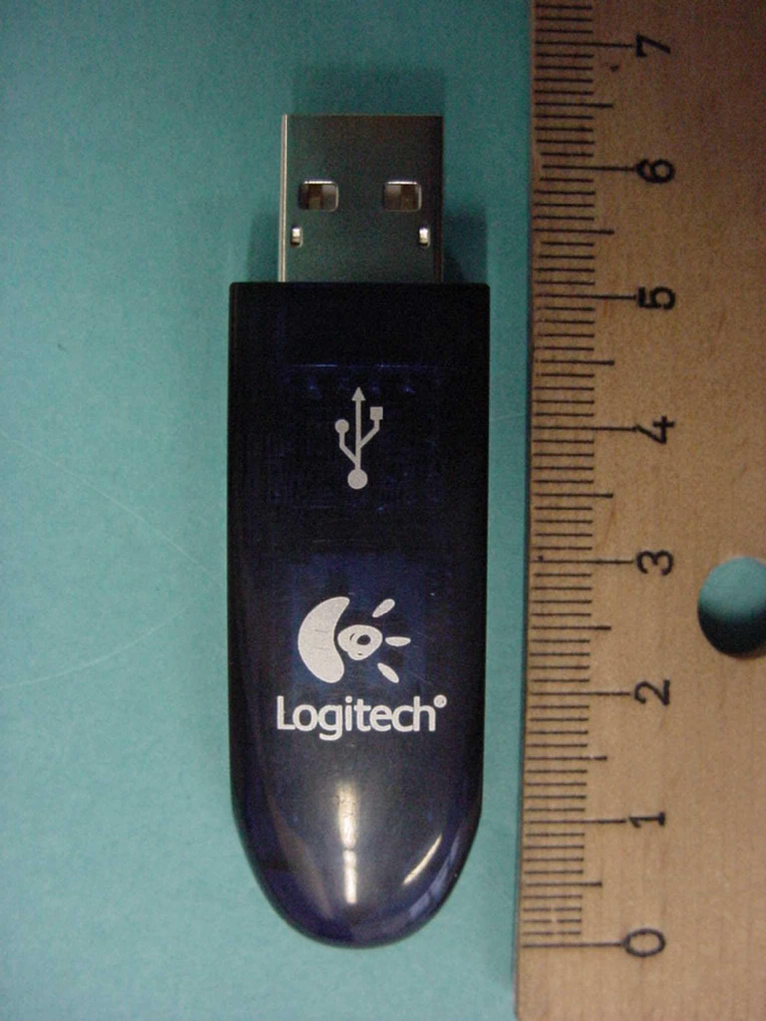 BT dongle - cordless presentation device - FCC ID DZL201565 - Logitech Inc