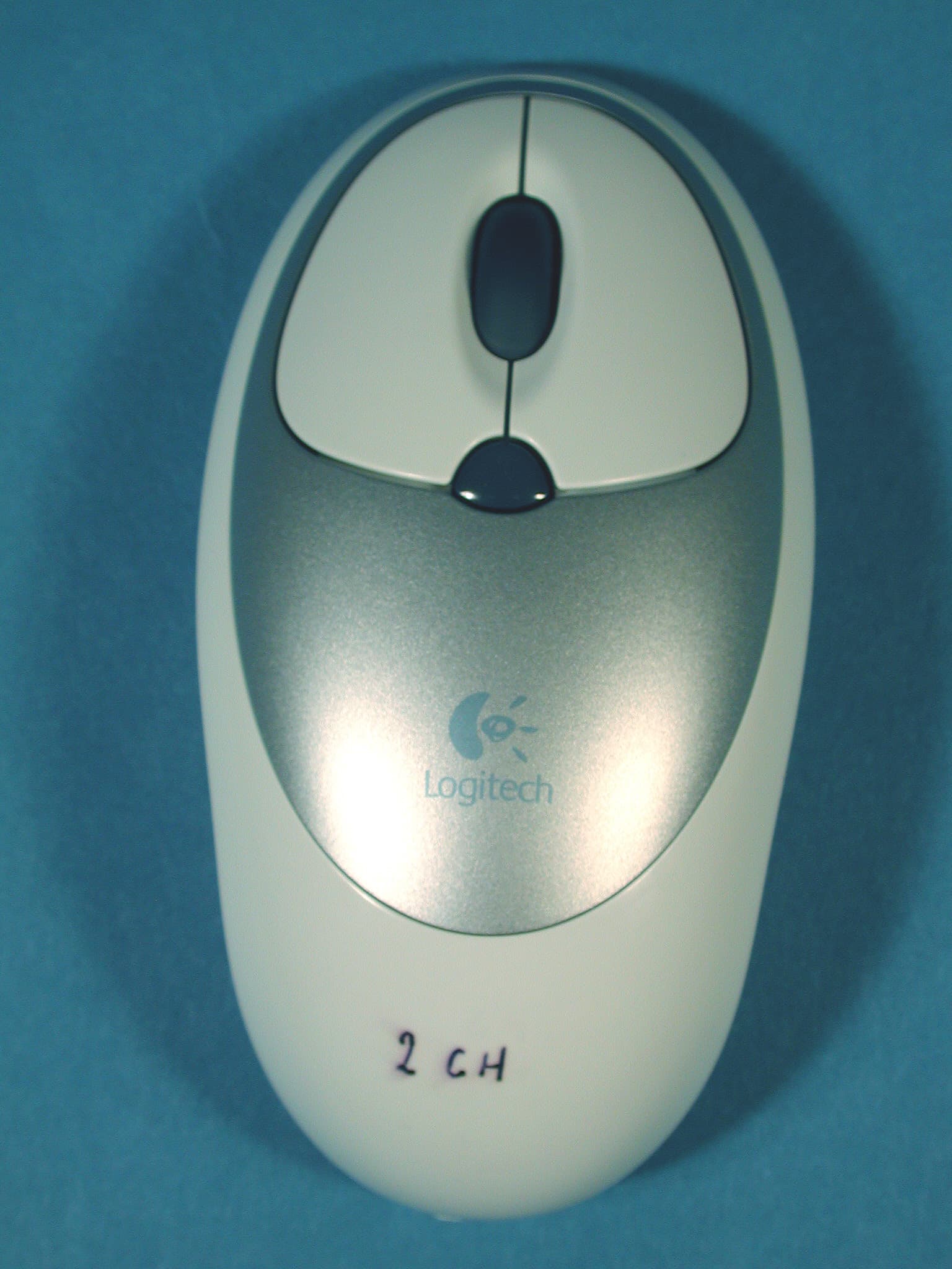 Logitech Cordless Click! Optical Mouse - FCC ID DZL211647 - Logitech Inc (2)
