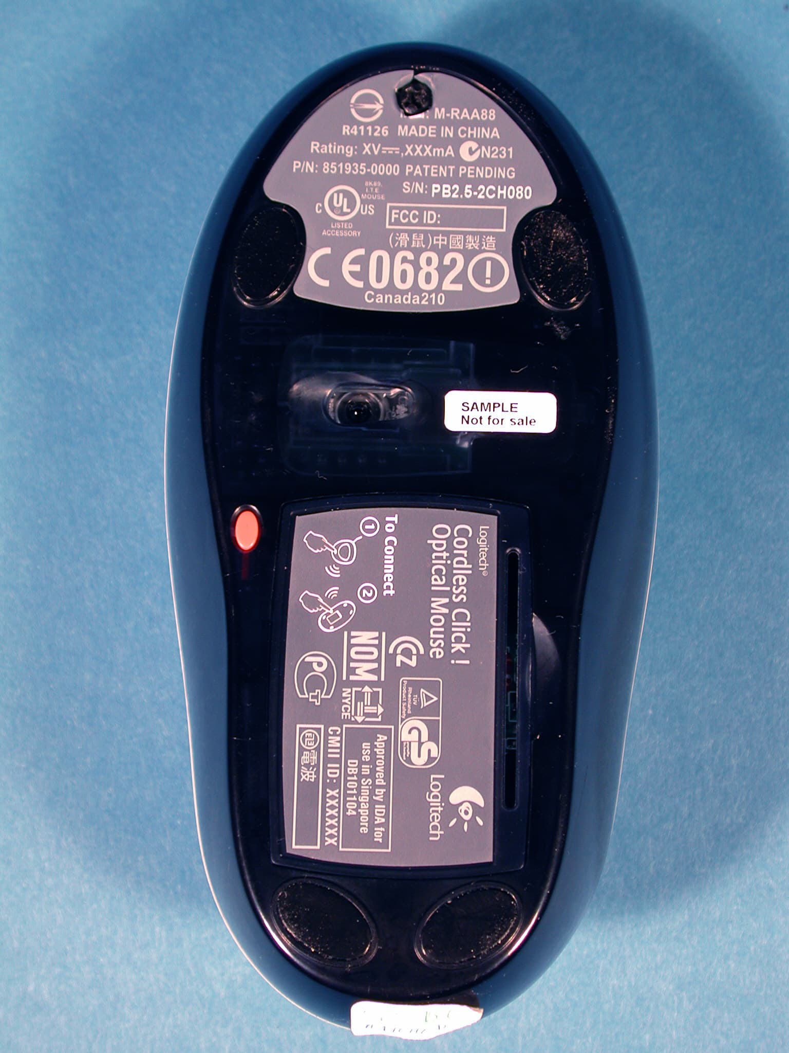Logitech Cordless Click! Optical Mouse - FCC ID DZL211647 - Logitech Inc (3)