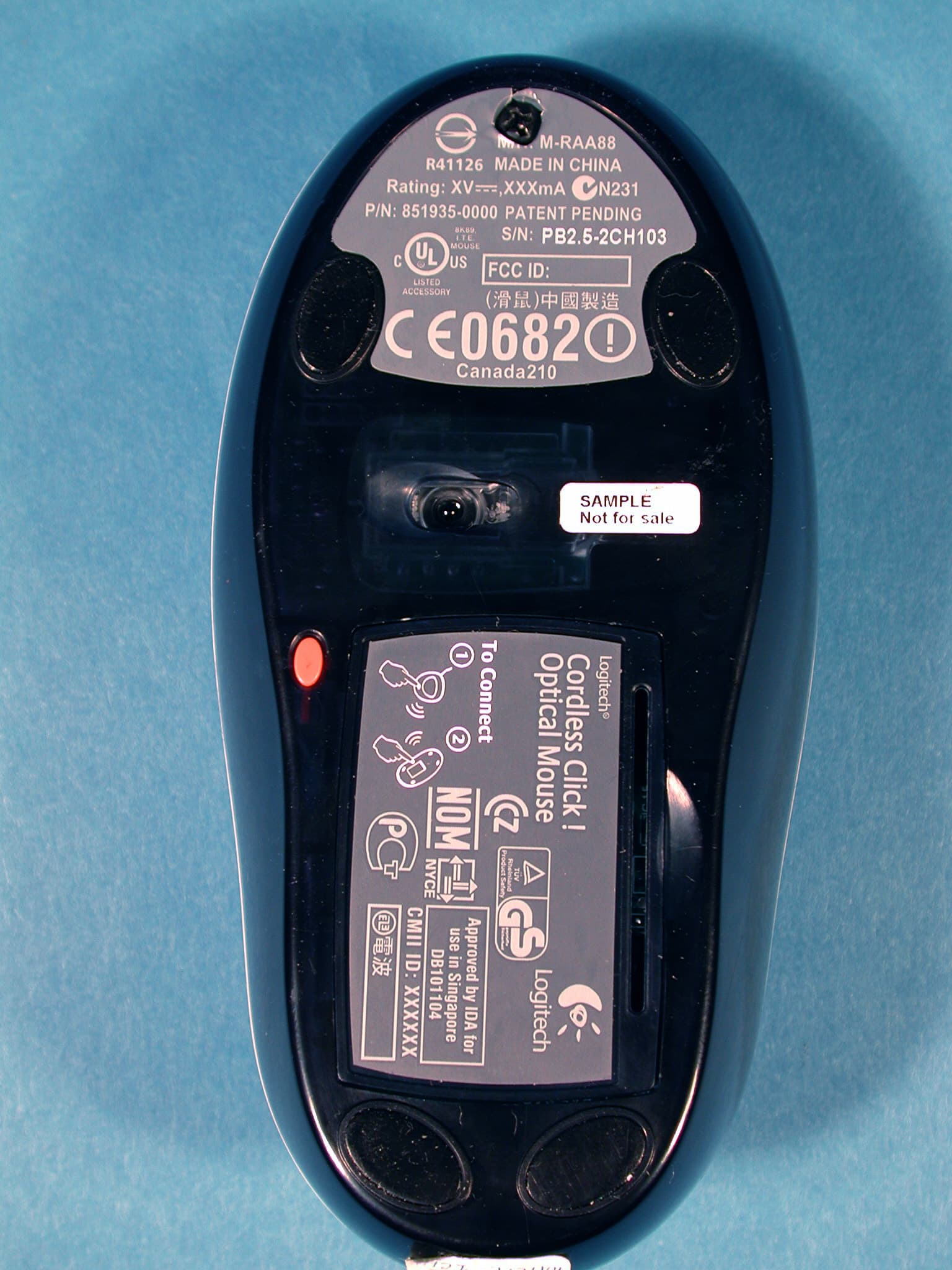 Logitech Cordless Click! Optical Mouse - FCC ID DZL211647 - Logitech Inc (4)