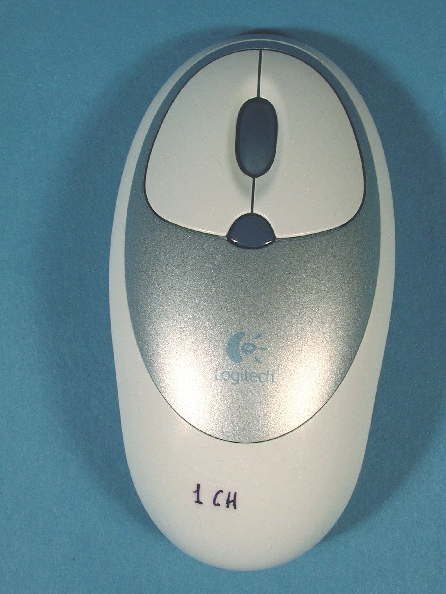 Logitech Cordless Click! Optical Mouse - FCC ID DZL211647 - Logitech Inc