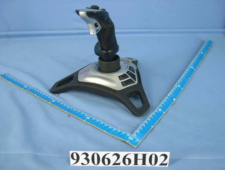 Logitech Freedom 2.4 Cordless Joystick - FCC ID DZLJUH16 - Logitech Inc