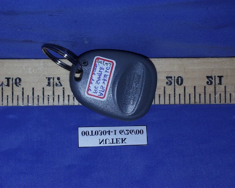 Car Alarm Transmitter - FCC ID ELVAT0D - Nutek Corporation