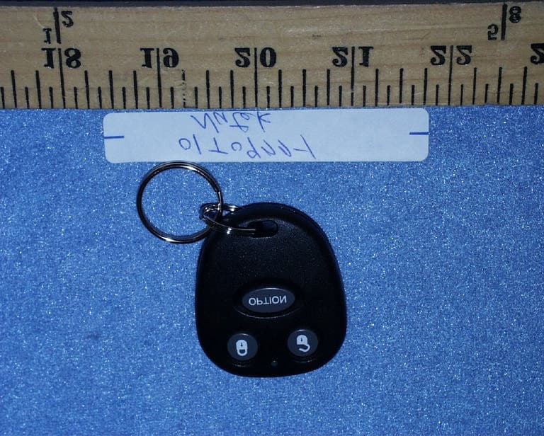Car Alarm Transmitter - FCC ID ELVAT1E - Nutek Corporation