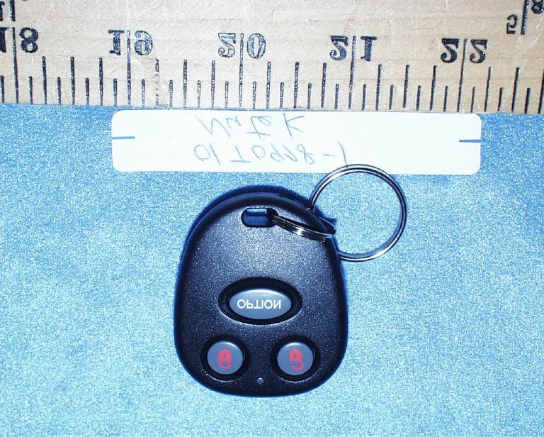 Car Alarm Transmitter - FCC ID ELVAT1F - Nutek Corporation