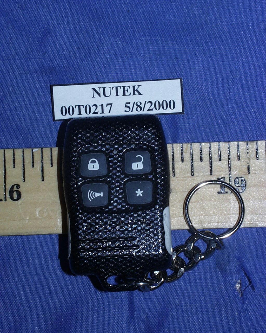 434 MHz Car Alarm Transmitter - FCC ID ELVMT0A - Nutek Corporation