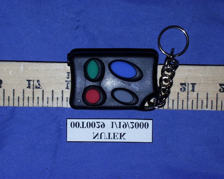 434MHz Transmitter - FCC ID ELVUT0A - Nutek Corporation