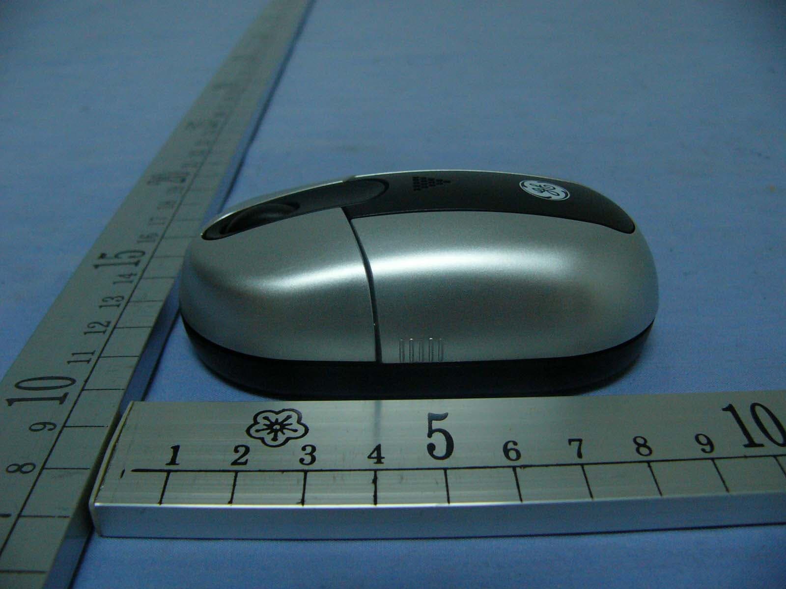 Wireless Mouse - FCC ID EMJM2CB06 - Primax Electronics Ltd