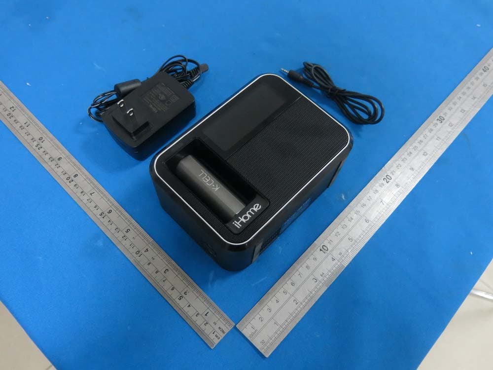 dual charging alarm clock with speakerphone and removable battery - FCC ID EMOIKT50 - SDI Technologies Inc. (2)