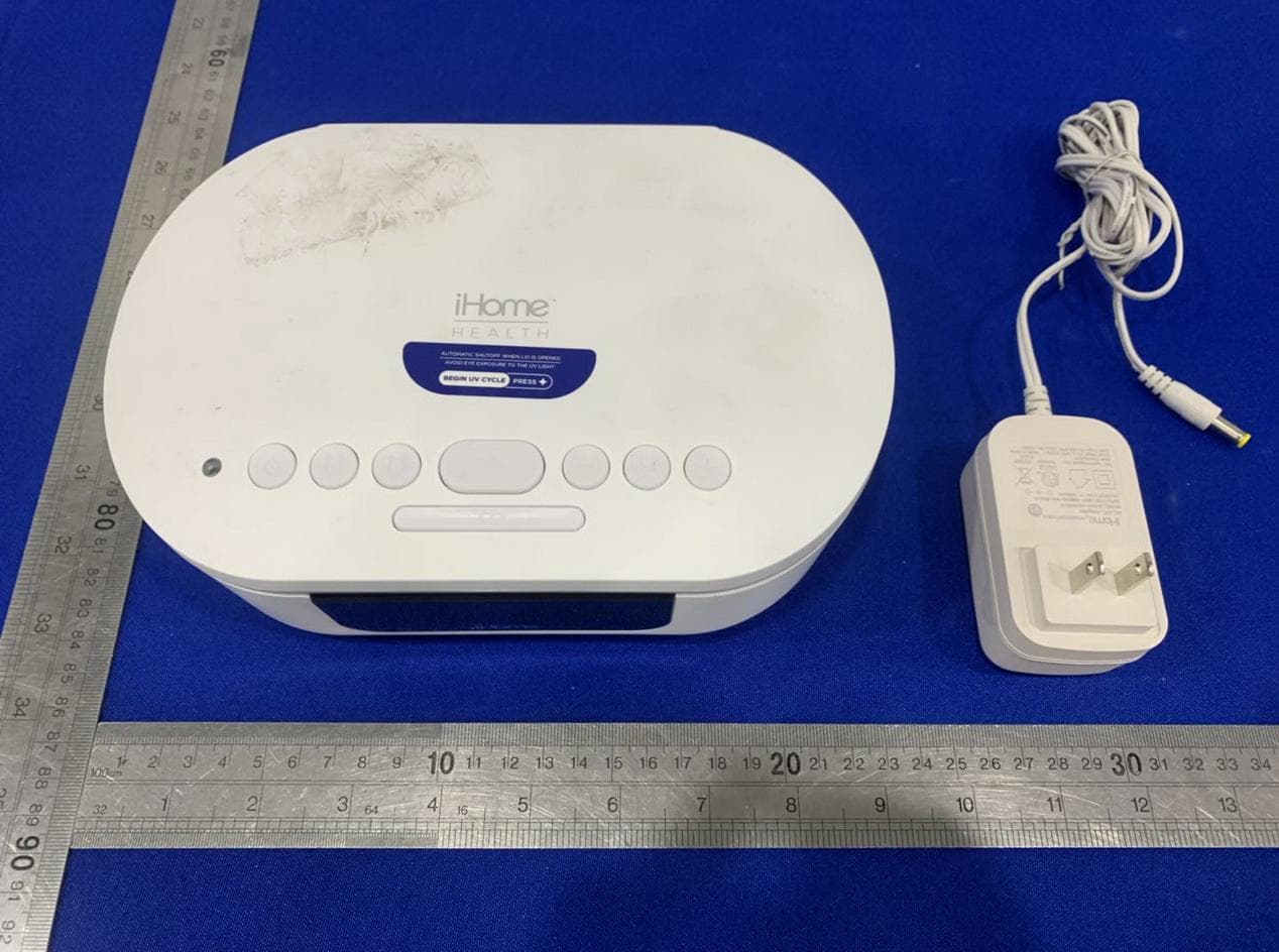 Bluetooth Alarm Clock with UV Sanitizing and USB charging - FCC ID EMOIUVBT1A - SDI Technologies Inc. (4)
