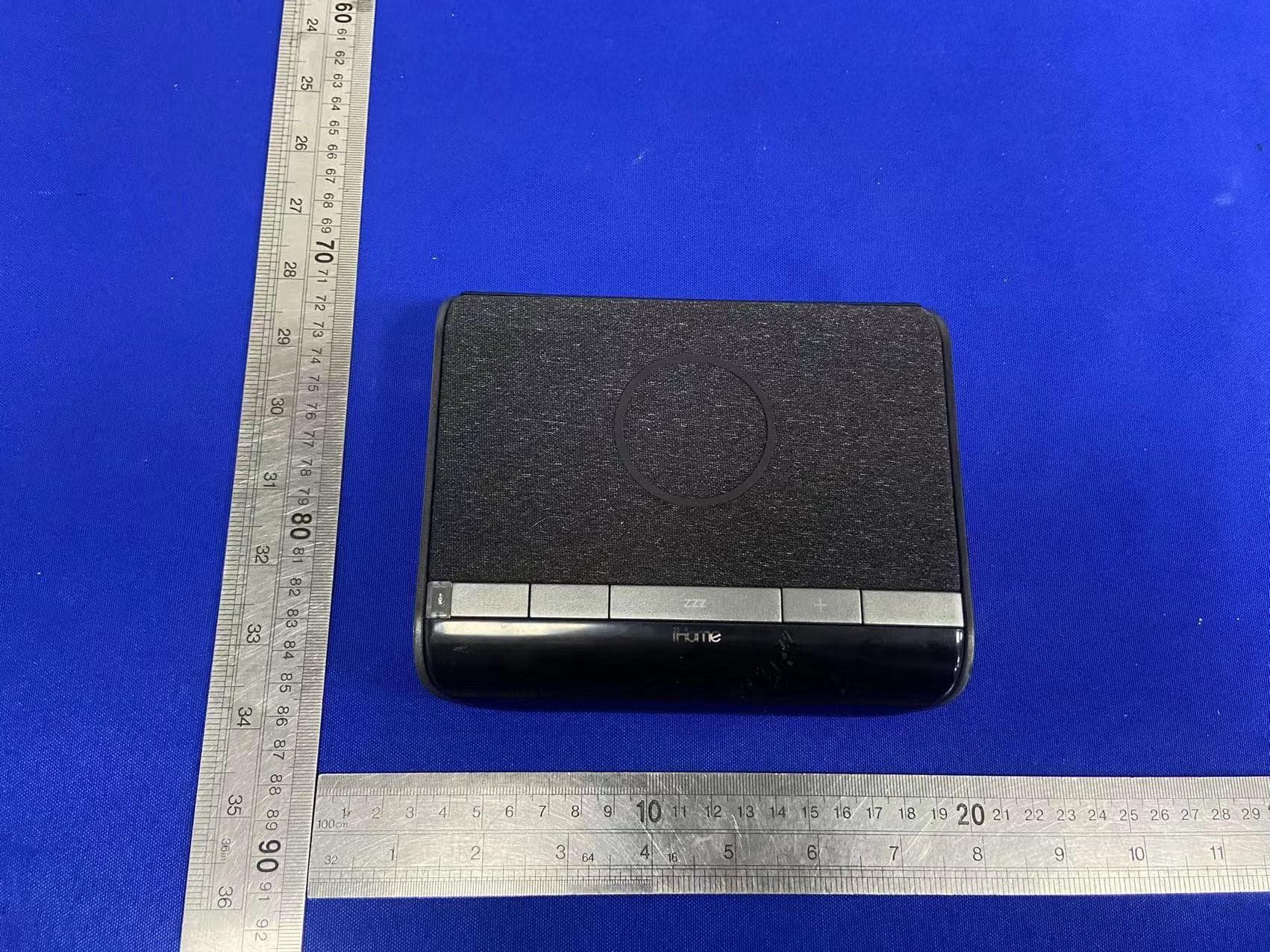 Compact Clock with Wireless Charging and Auto-Dimming Acrylic Display - FCC ID EMOIW24A - SDI Technologies Inc.