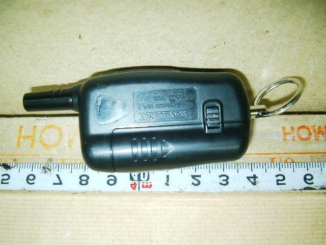 Car Alarm Transceiver - FCC ID EZSDEI477T - Voxx Electronics Corporation