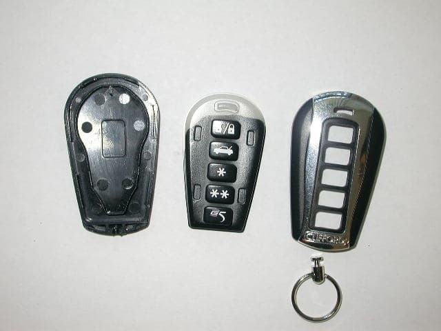 Security/Remote Control Transmitter - FCC ID EZSDEI7151 - Voxx Electronics Corporation