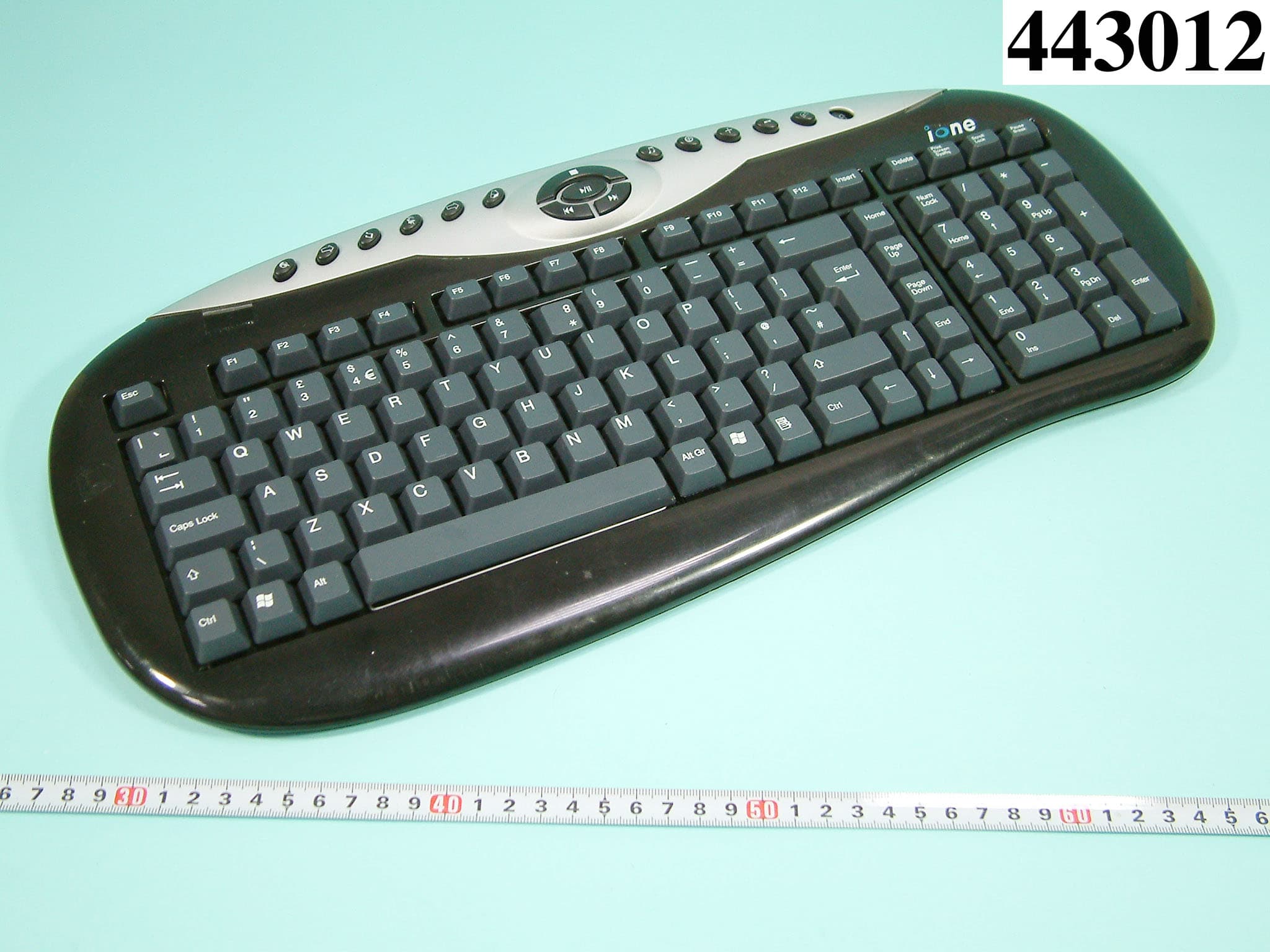 RF KEYBOARD - FCC ID F2QRFCOMBOSCM7UP - Ione International Co., Ltd.