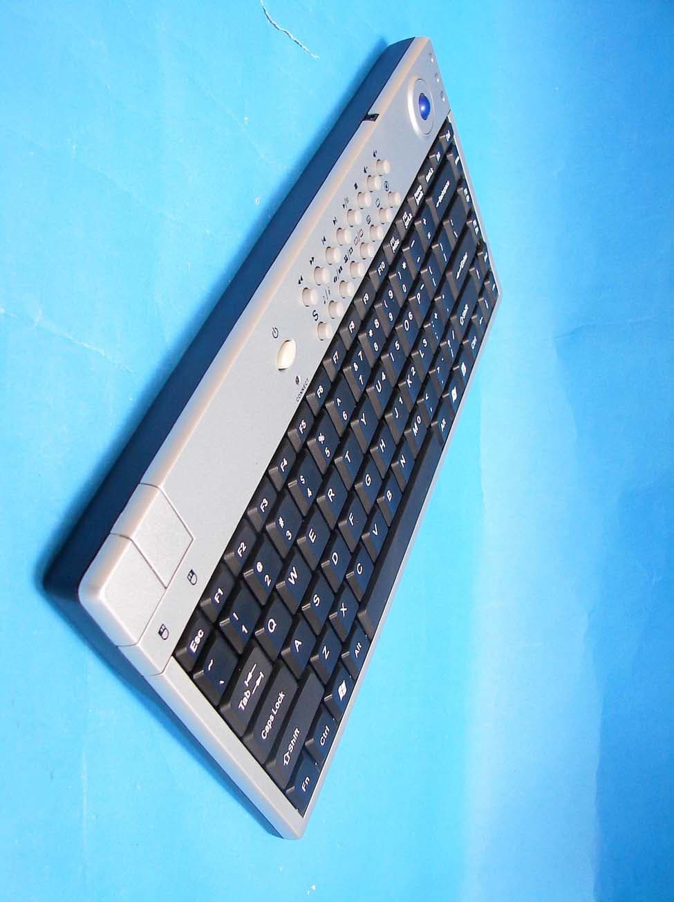 2.4 GHz MCE Keyboard with Optical Trackball - FCC ID F2QSCORPIUSP20MTU - Ione International Co., Ltd.