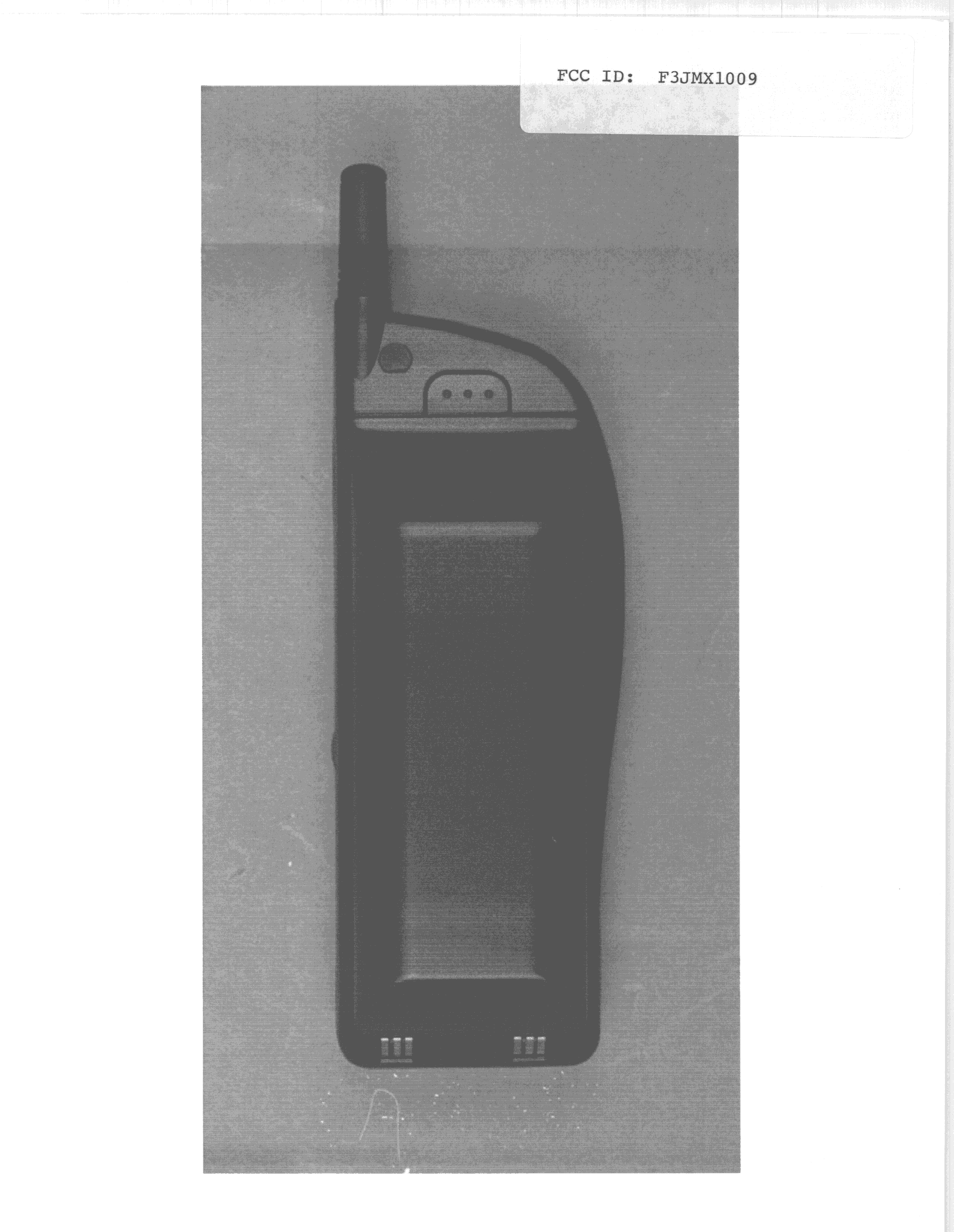 TNE - Licensed Non-Broadcast Transmitter Held to Ear - FCC ID F3JMX1009 - Midland Radio Corporation (4)