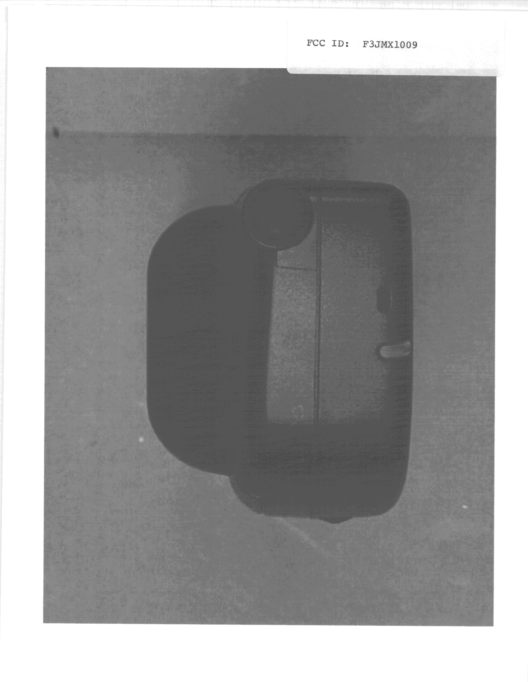 TNE - Licensed Non-Broadcast Transmitter Held to Ear - FCC ID F3JMX1009 - Midland Radio Corporation (2)