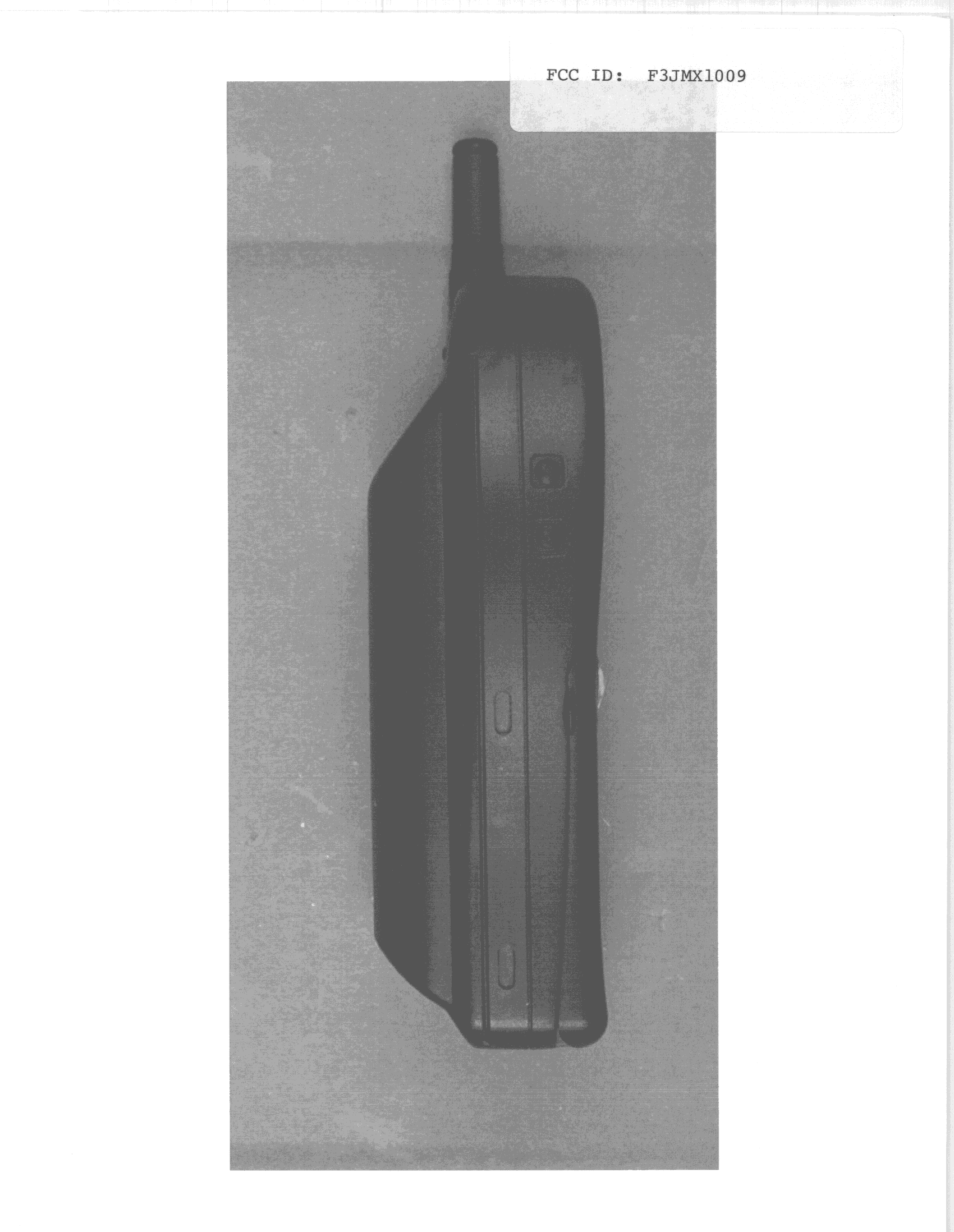 TNE - Licensed Non-Broadcast Transmitter Held to Ear - FCC ID F3JMX1009 - Midland Radio Corporation (5)