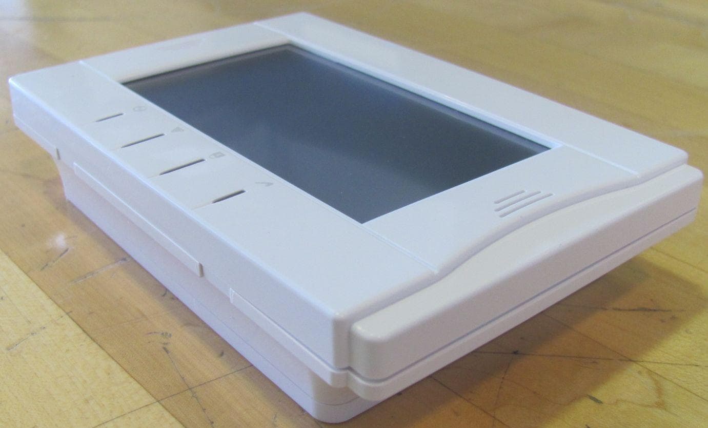 Wireless Touchscreen Keypad for Alarm System - FCC ID F5313WTK5504P - Tyco Safety Products Canada Ltd. (1)